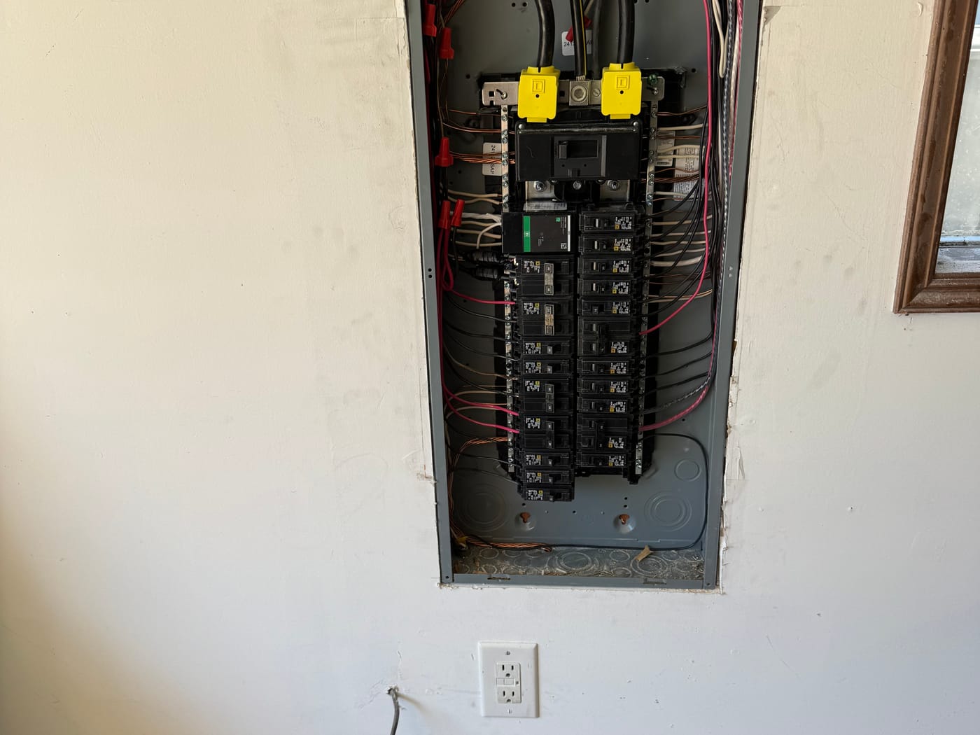 A finished 200-amp electrical panel installed and neatly labeled by Total Wire Electric