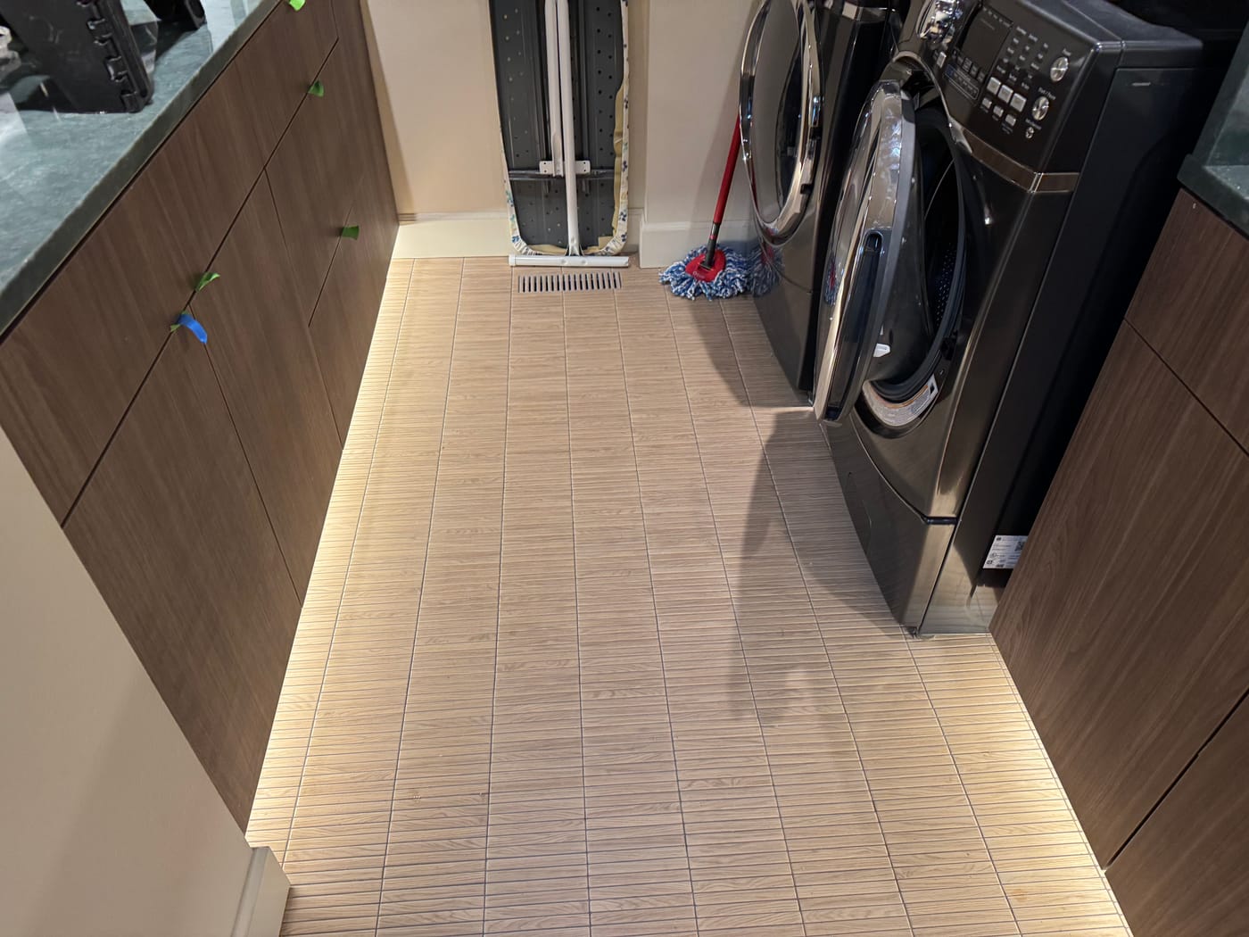 Laundry room with under-cabinet and toe-kick LED lighting